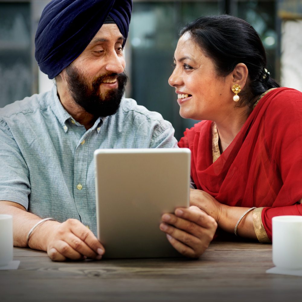 Couple reviewing their loan details on a tablet
