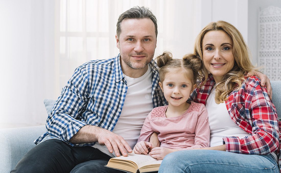 Family relaxing in their new home